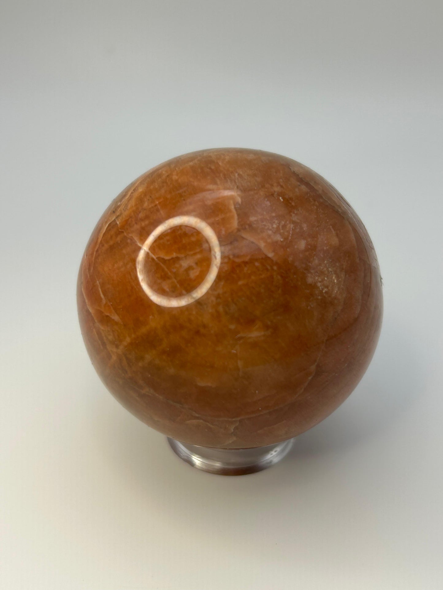 Sfera in pietra di luna pesca